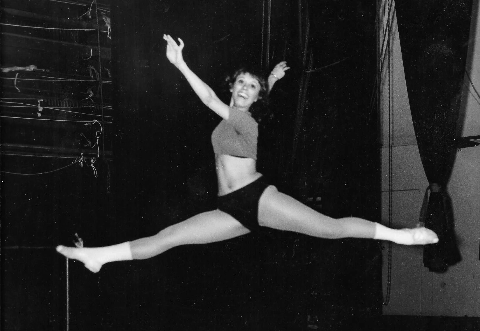 Michele Hart mid-leap, jazz dance.